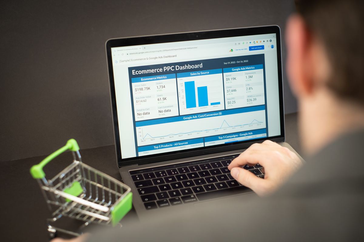 A website analytics dashboard on a laptop screen showing traffic and engagement charts